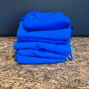 Figs Women's Short Sleeve Tee - Vibrant Blue 
5 pairs of pants and 2 tops